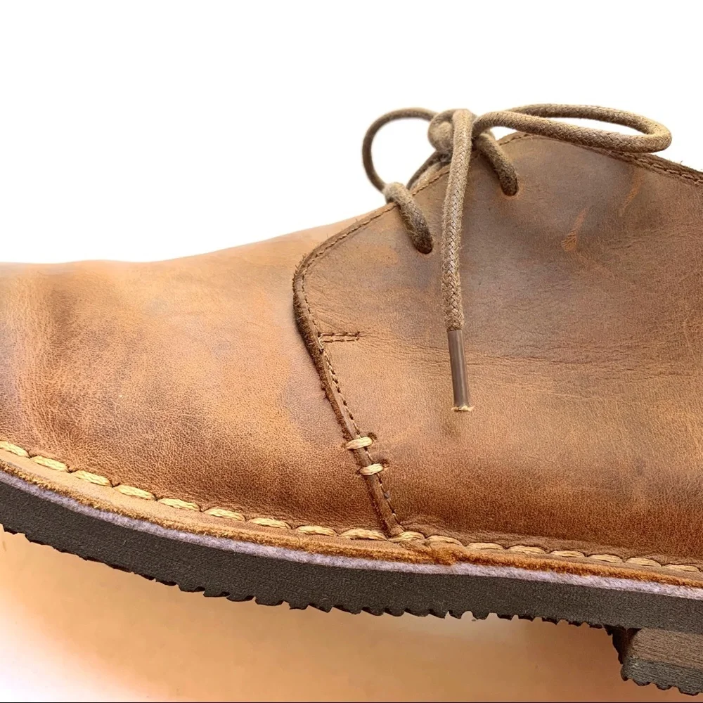 Men's two-eye lace-up shoes in brown, size 12.